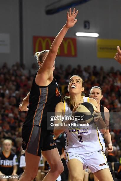 Louella Tomlinson of the Boomers drives to the basket past Suzy Batkovic of the Fire during game three of the WNBL Grand Final series between the...