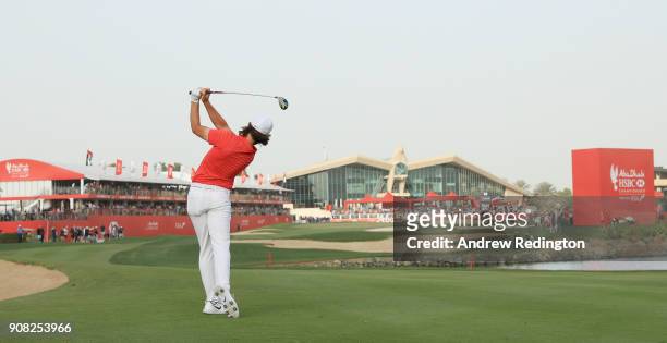 Tommy Fleetwood of England plays his second shot on the 18th hole during the final round of the Abu Dhabi HSBC Golf Championship at Abu Dhabi Golf...