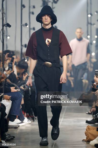 Model presents creations by Lanvin during men's Fashion Week for the Fall/Winter 2018/2019 collection in Paris on January 21, 2018.