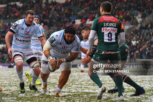 Racing 92's New Zealand prop Ben Tameifuna gathers the ball during the European Champions Cup Pool 4 rugby union match between Leicester Tigers and...