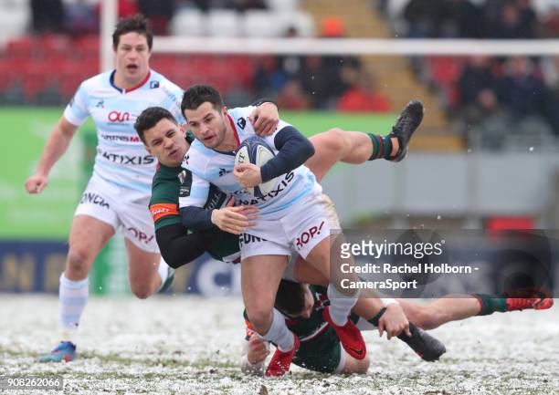 Racing 92's Brice Dulin tackled by Leicester Tigers' Matt Toomua during the European Rugby Champions Cup match between Leicester Tigers and Racing 92...
