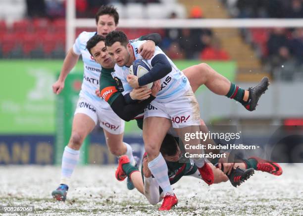 Racing 92's Brice Dulin tackled by Leicester Tigers' Matt Toomua during the European Rugby Champions Cup match between Leicester Tigers and Racing 92...