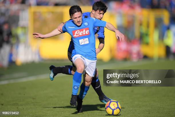 Napoli's midfielder Mario Rui from Portugal fights for the ball with Atalanta's midfielder Riccardo Orsolini during the Italian Serie A football...