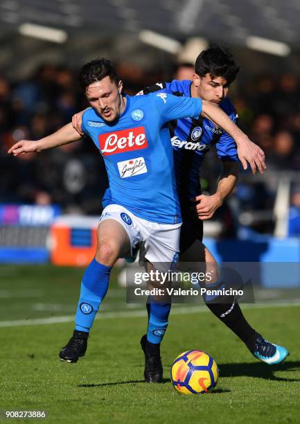 Riccardo Orsolini of Atalanta BC clshes with Mario Rui of SSC Napoli during the serie A match between Atalanta BC and SSC Napoli at Stadio Atleti...