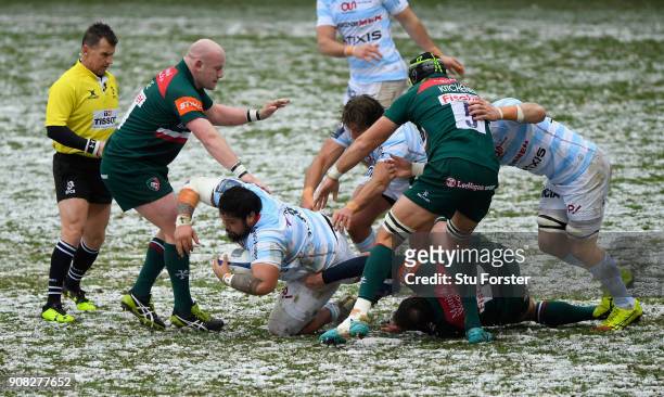 Racing prop Ben Tameifuna makes yardage in the snow during the European Rugby Champions Cup match between Leicester Tigers and Racing 92 at Welford...