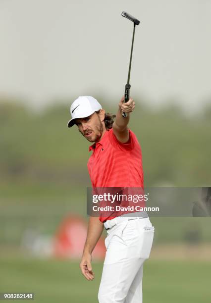 Tommy Fleetwood of England holes his for birdie on the 16th green on the way to his two shot win during the final round of the Abu Dhabi HSBC Golf...