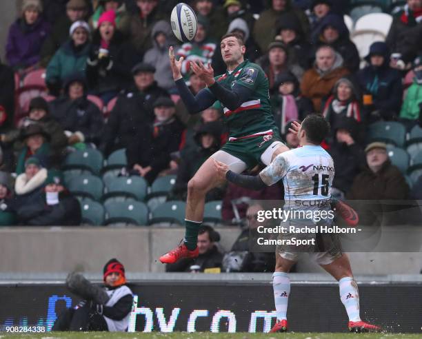 Leicester Tigers' Jonny May is tackled in the air by Racing 92's Brice Dulin during the European Rugby Champions Cup match between Leicester Tigers...