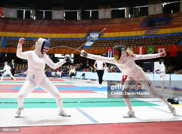 Ricarda Multerer of Germany fences Kelley Hurley of the USA during competition at the Women's Epee World Cup on January 20, 2018 at the Coliseo de la...