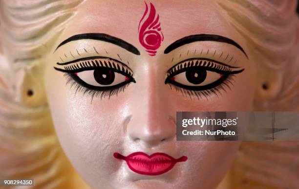 An artist giving his final touch to an idol of Devi Saraswati at Jagannath Hall of Dhaka University, Bangladesh, on 21 January 2018.