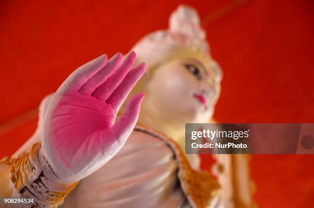 An artist giving his final touch to an idol of Devi Saraswati at Jagannath Hall of Dhaka University, Bangladesh, on 21 January 2018.