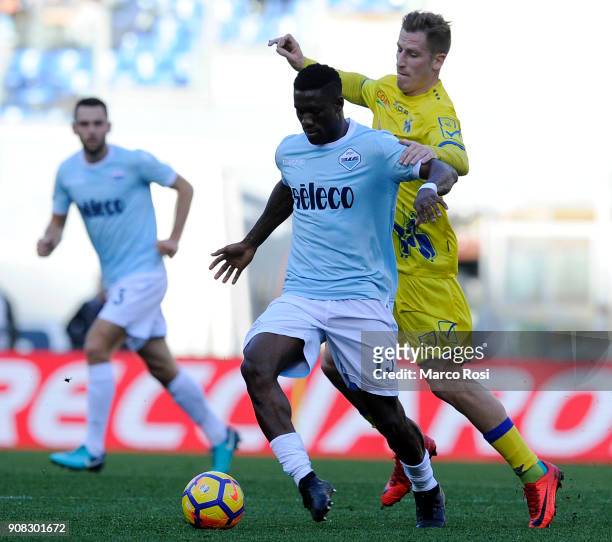Quissanga Bastos of SS Lazio competes for the ball with Valter Birsa of AC Chievo Verona during the Serie A match between SS Lazio and AC Chievo...