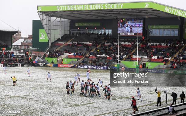 General view of a lineout on the snow covered pitch during the European Rugby Champions Cup match between Leicester Tigers and Racing 92 at Welford...
