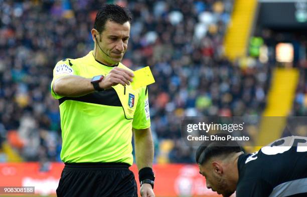 Referee Doveri shows yellow card to Giuseppe Pezzella of Udinese during the serie A match between Udinese Calcio and Spal at Stadio Friuli on January...