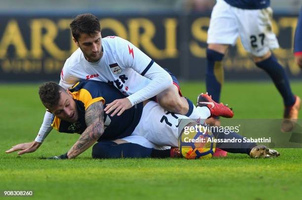 Marcel Buchel of Hellas Verona competes for the ball whit Andrea Barberis of FC Crotone during the serie A match between Hellas Verona FC and FC...