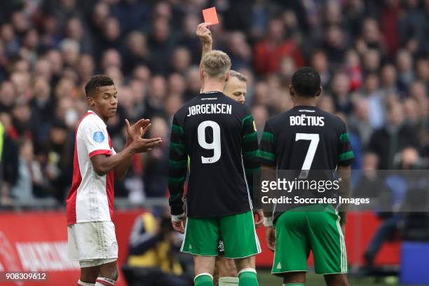 Nicolai Jorgensen of Feyenoord receives a red card from referee Bjorn Kuipers during the Dutch Eredivisie match between Ajax v Feyenoord at the Johan...