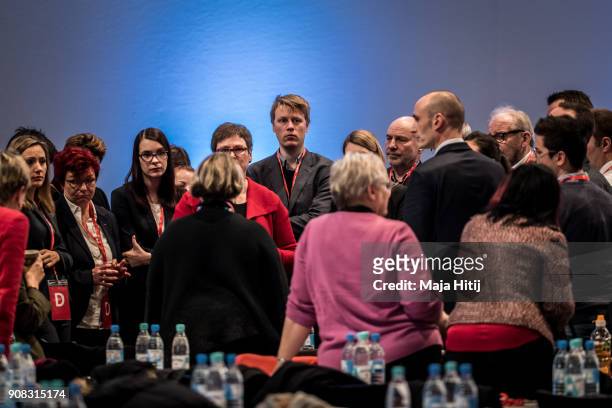 Delegates of Germany's social democratic SPD stand at the SPD federal congress on January 21, 2018 in Bonn, Germany. The SPD is holding the congress...