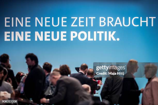 Delegates of Germany's social democratic SPD stand at the SPD federal congress on January 21, 2018 in Bonn, Germany. The SPD is holding the congress...