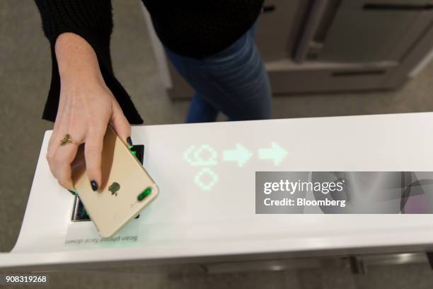An Amazon.com Inc. Employee scans in to shop at the Amazon Go store in Seattle, Washington, U.S., on Wednesday, Jan. 17, 2018. After more than a year...