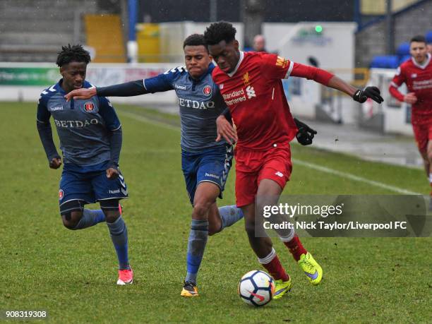 Ovie Ejaria of Liverpool and Jamie Mascoll of Charlton Athletic in action during the Liverpool U23 v Charlton Athletic U23 Premier League Cup game at...