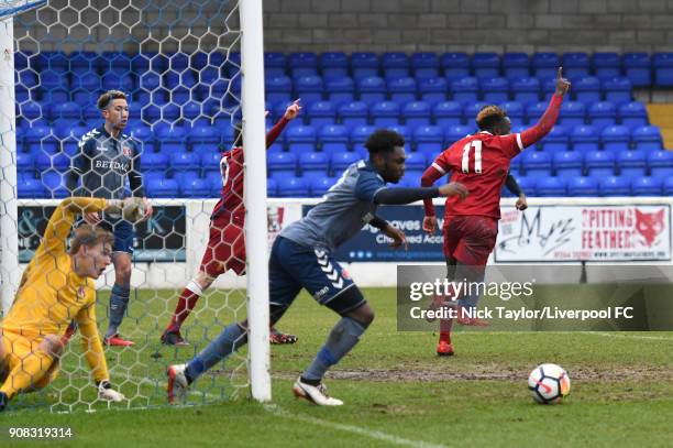 Bobby Adekanye of Liverpool celebrates scoring the opening goal during the Liverpool U23 v Charlton Athletic U23 Premier League Cup game at The...