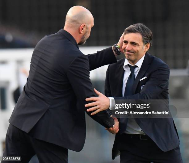 Head coach Walter Zenga of FC Crotone shankes hands with head coach Fabio Pecchia of Hellas Verona during the serie A match between Hellas Verona FC...