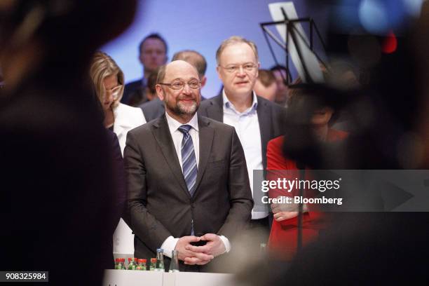 Martin Schulz, leader of the Social Democrat Party , looks on as members sing during a party conference in Bonn, Germany, on Sunday, Jan. 21, 2018....