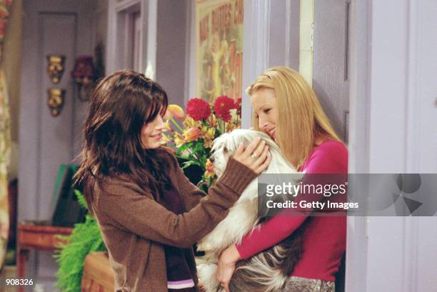 Actors : Courteney Cox Arquette as Monica Geller and Lisa Kudrow as Phoebe Buffay star in NBC's comedy series "Friends" Episode: "The One Where...