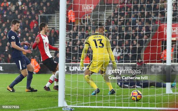 Davinson Sanchez of Tottenham Hotspur looks on as he scores an own goal for Southampton's first goal past Michel Vorm of Tottenham Hotspur during the...