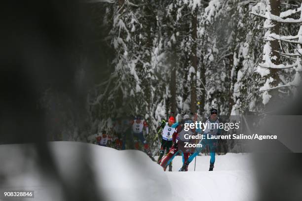 Simon Desthieux of France competes, Anton Shatagin of Russia competes, Arnd Peiffer of Germany competes during the IBU Biathlon World Cup Men's and...