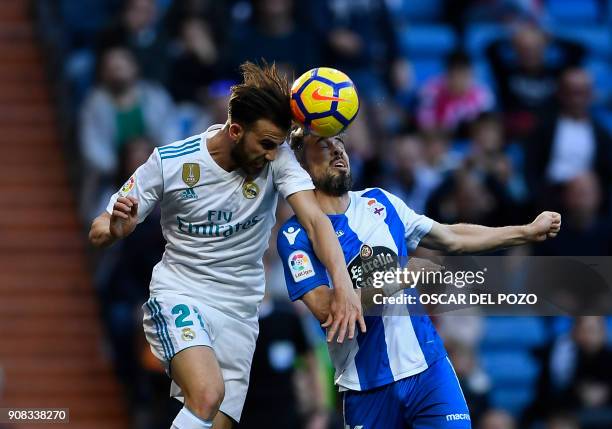 Real Madrid's spanish forward Borja Mayoral vies with Deportivo La Coruna's Portuguese defender Luisinho during the Spanish league football match...