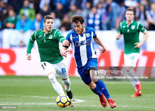 Ruben Perez of Club Deportivo Leganes duels for the ball with Ibai Gomez of Deportivo Alaves during the La Liga match between Deportivo Alaves and...