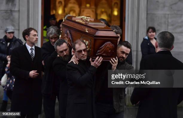 Members of The Cranberries, Fergal Lawler , Noel Hogan and Mike Hogan help carry Dolores O'Riordan's coffin from St. Joseph's church on January 21,...