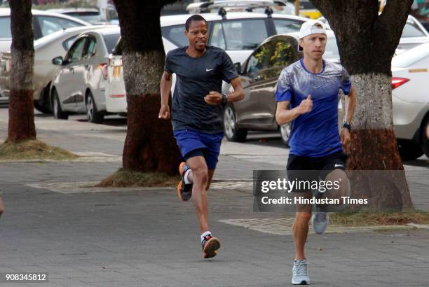 International long distance runner Hendric Ramaala and Marius Lonescu practice at Nariman Point a day before Mumbai Marathon on January 20, 2018 in...