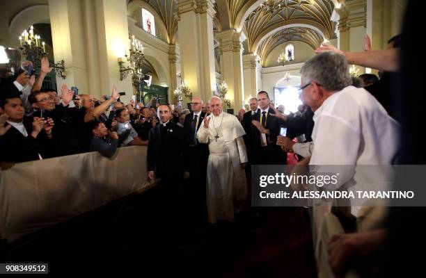 Pope Francis arrives at Lima's Cathedral to pray before the relics of Peruvian saints, on January 21, 2018. Before wrapping up his visit to Peru,...