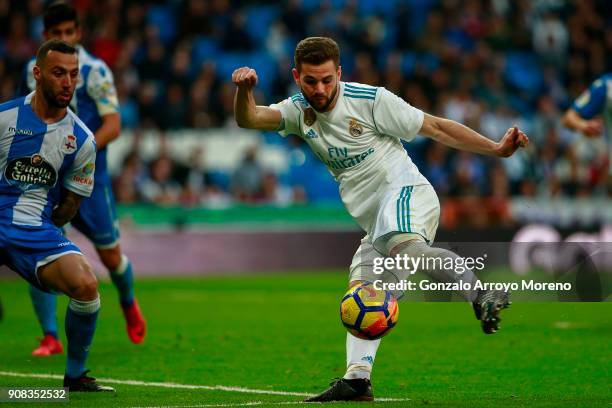 Nacho Fernandez of Real Madrid CF scores their seventh goal during the La Liga match between Real Madrid CF and Deportivo La Coruna at Estadio...