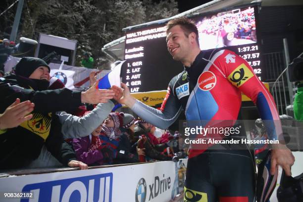 Nico Walther of Germany celebrates victory at Deutsche Post Eisarena Koenigssee after winning the BMW IBSF World Cup 4-man Bobsleigh on January 19,...