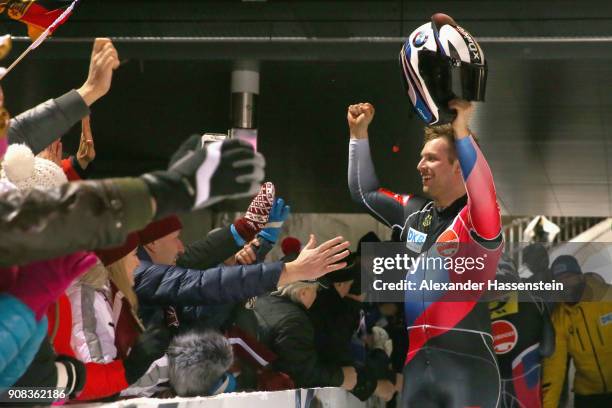 Nico Walther of Germany celebrates victory at Deutsche Post Eisarena Koenigssee after winning the BMW IBSF World Cup 4-man Bobsleigh on January 19,...