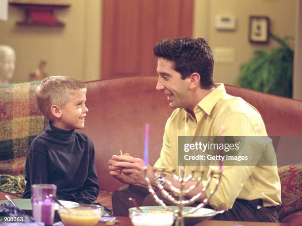Actors Cole Mitchell Sprouse as Ben and David Schwimmer as Ross Geller star in NBC's comedy series "Friends" episode "The One with the Holiday...