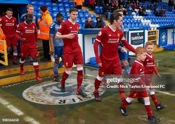 Liverpool captain Harry Wilson leads his team to the pich at the start of the Liverpool U23 v Charlton Athletic U23 Premier League Cup game at The...