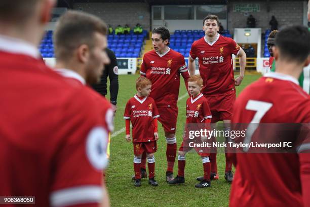 Liverpool captain Harry Wilson and Conor Masterson line up as the remainder of their team join them at the start of the Liverpool U23 v Charlton...