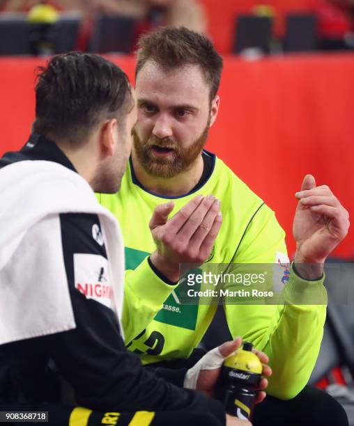 Goalkeepers Silvio Heinevetter and Andreas Wolff of Germany discuss during the Men's Handball European Championship main round group 2 match between...