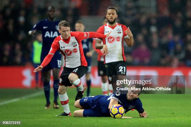 Harry Kane of Tottenham Hotspur in action with Steven Davis and Ryan Bertrand of Southampton during the Premier League match between Southampton and...