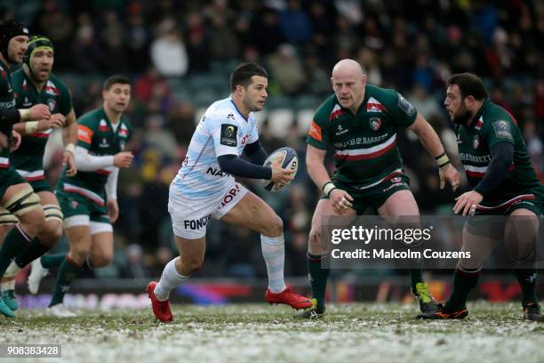 Brice Dulin of Racing 92 runs at Dan Cole and Greg Bateman of Leicester Tigers during the European Rugby Champions Cup match between Leicester Tigers...