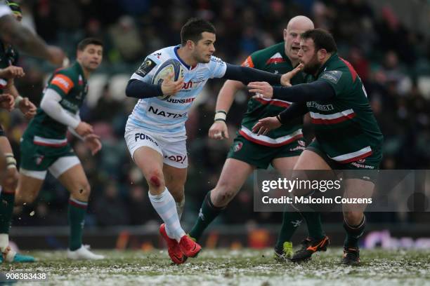 Brice Dulin of Racing 92 runs at Dan Cole and Greg Bateman of Leicester Tigers during the European Rugby Champions Cup match between Leicester Tigers...