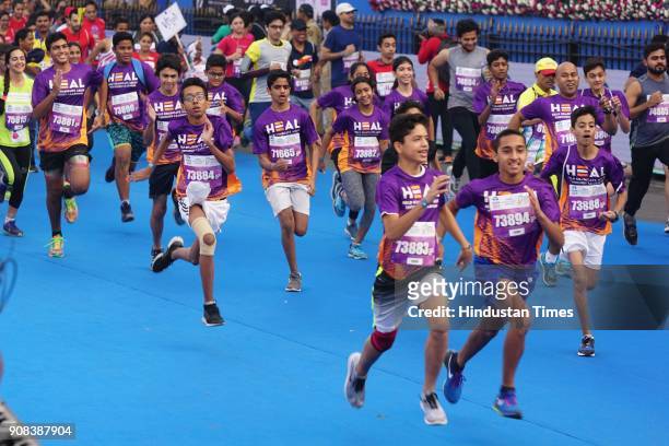 People participate during Tata Mumbai Marathon 2018 on January 21, 2018 in Mumbai, India.
