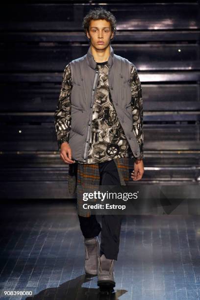 Model walks the runway during the White Mountaineering Menswear Fall/Winter 2018-2019 show as part of Paris Fashion Week on January 20, 2018 in...