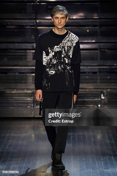 Model walks the runway during the White Mountaineering Menswear Fall/Winter 2018-2019 show as part of Paris Fashion Week on January 20, 2018 in...