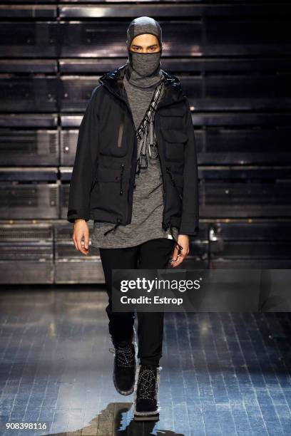 Model walks the runway during the White Mountaineering Menswear Fall/Winter 2018-2019 show as part of Paris Fashion Week on January 20, 2018 in...