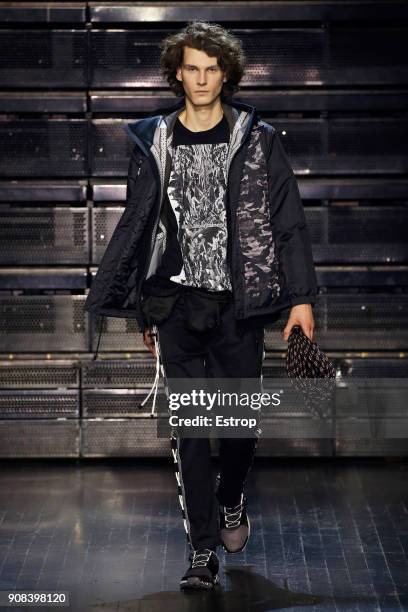 Model walks the runway during the White Mountaineering Menswear Fall/Winter 2018-2019 show as part of Paris Fashion Week on January 20, 2018 in...