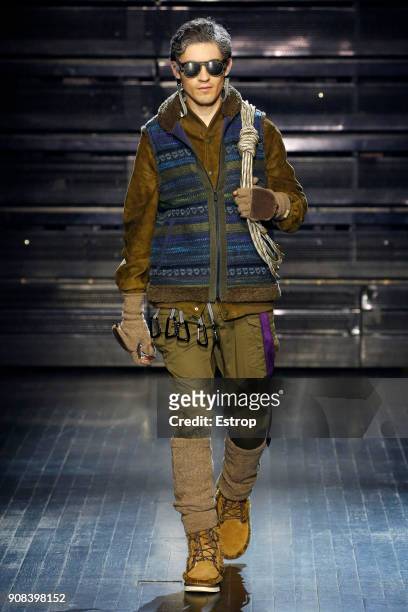Model walks the runway during the White Mountaineering Menswear Fall/Winter 2018-2019 show as part of Paris Fashion Week on January 20, 2018 in...